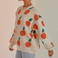 Tangerine patterned knitted sweater