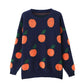 Tangerine patterned knitted sweater