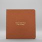 There's No Place Like Orange Foil Embossed Square Linen Notebook