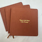 There's No Place Like Orange Foil Embossed Square Linen Notebook
