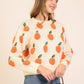 Playful Orange Pattern Knit Sweater