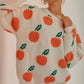 Tangerine patterned knitted sweater