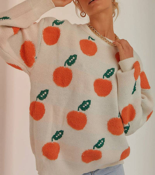 Tangerine patterned knitted sweater